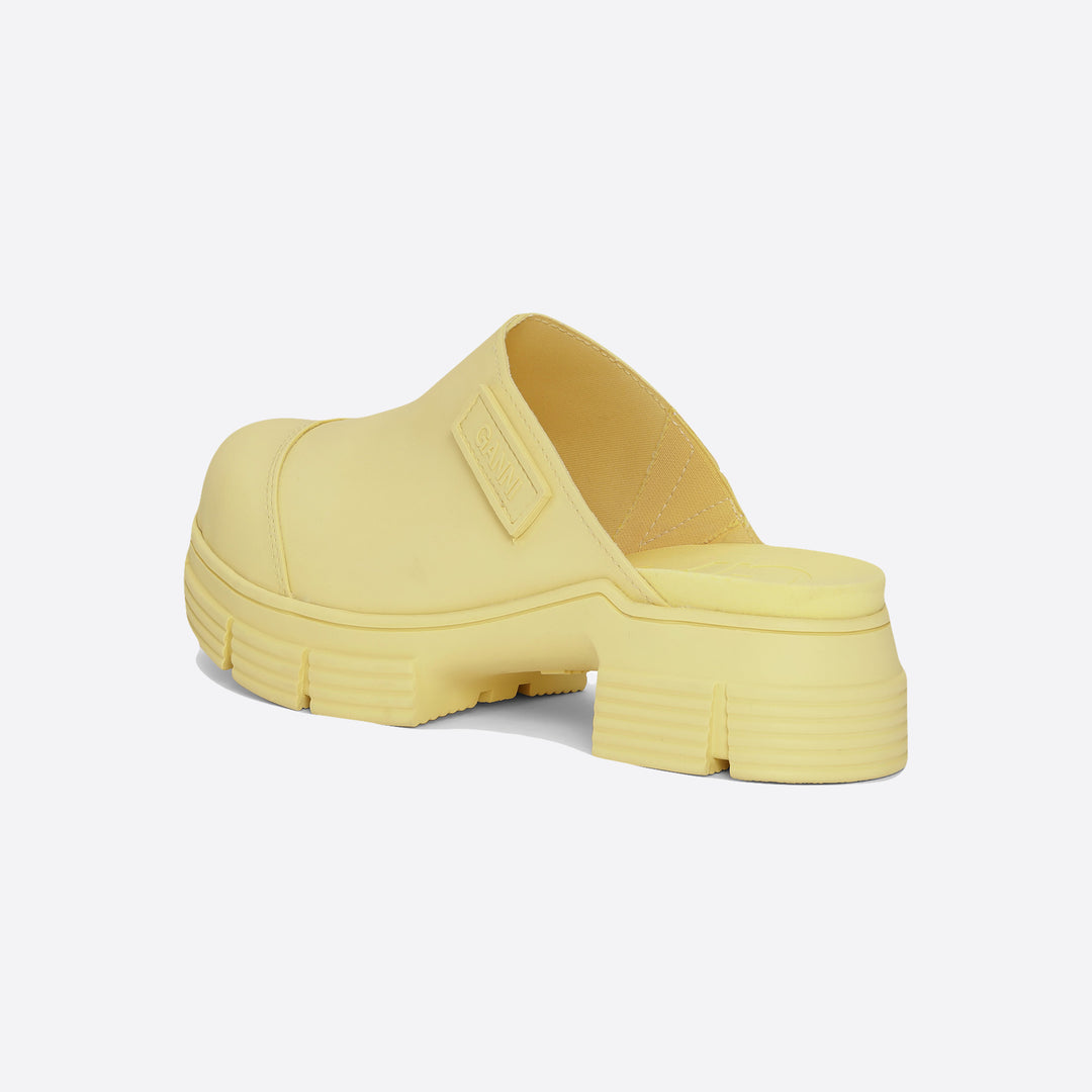 Ganni Recycled Rubber City Mules in Pale Banana